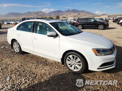 Czwarte zdjęcie samochodu z boku: 2015 VOLKSWAGEN JETTA TDI VIN:3VWLA7AJ4FM332360 - miniatura