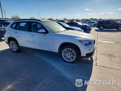Czwarte zdjęcie samochodu z boku: 2015 BMW X1 SDRIVE28I VIN:WBAVM1C57FVW58009 - miniatura