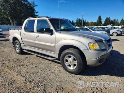 Czwarte zdjęcie samochodu z boku: 2003 FORD EXPLORER SPORT TRAC VIN:1FMZU77E33UC31635 - miniatura