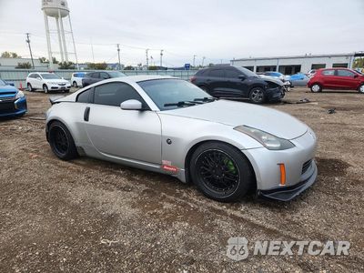 Czwarte zdjęcie samochodu z boku: 2003 NISSAN 350Z COUPE VIN:JN1AZ34DX3T104381 - miniatura