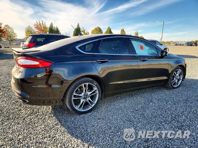 Trzecie zdjęcie samochodu z tyłu: 2014 FORD FUSION TITANIUM VIN:3FA6P0D95ER158703 - miniatura