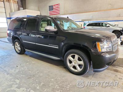 Czwarte zdjęcie samochodu z boku: 2012 CHEVROLET SUBURBAN K1500 LTZ VIN:1GNSKKE78CR276258 - miniatura
