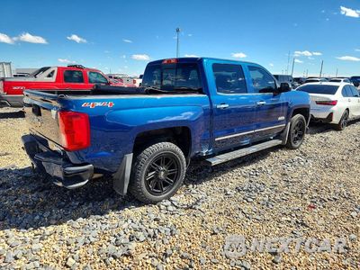Trzecie zdjęcie samochodu z tyłu: 2017 CHEVROLET SILVERADO K1500 HIGH COUNTRY VIN:3GCUKTEC6HG443857 - miniatura