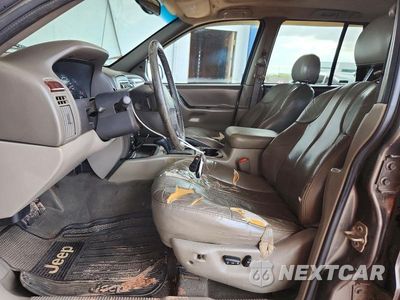 Zdjęcie 7 z 13 samochodu: 2000 JEEP GRAND CHEROKEE LAREDO VIN:1J4GW48N0YC241940 - miniatura