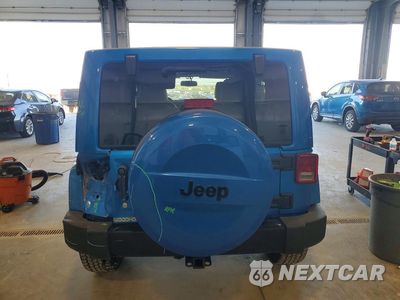 Zdjęcie 6 z 12 samochodu: 2014 JEEP WRANGLER UNLIMITED SAHARA VIN:1C4HJWEG9EL254093 - miniatura