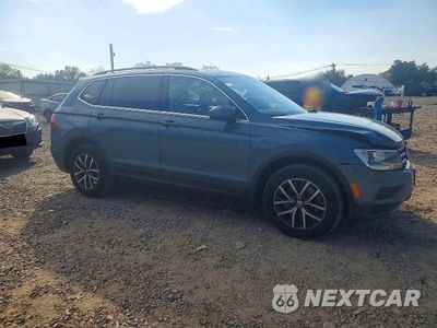 Czwarte zdjęcie samochodu z boku: 2019 VOLKSWAGEN TIGUAN SE VIN:3VV2B7AX9KM112658 - miniatura