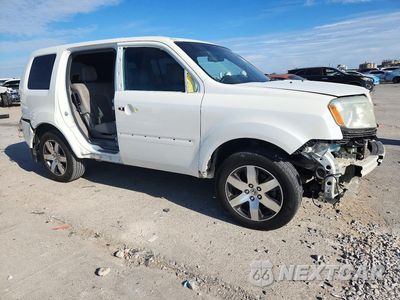 Czwarte zdjęcie samochodu z boku: 2012 HONDA PILOT TOURING VIN:5FNYF4H96CB061354 - miniatura