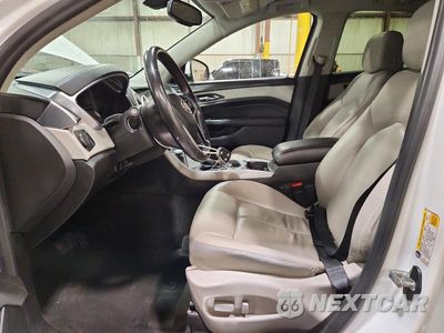 Zdjęcie 7 z 13 samochodu: 2015 CADILLAC SRX VIN:3GYFNAE36FS596554 - miniatura