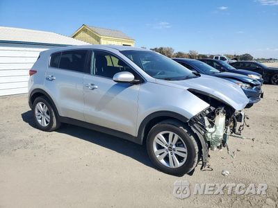 Czwarte zdjęcie samochodu z boku: 2019 KIA SPORTAGE LX VIN:KNDPM3AC7K7526827 - miniatura