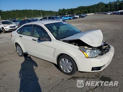 Czwarte zdjęcie samochodu z boku: 2009 FORD FOCUS S VIN:1FAHP34N09W133475 - miniatura