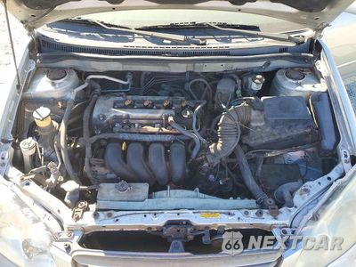 Zdjęcie 11 z 12 samochodu: 2004 TOYOTA COROLLA LE VIN:JTDBR38E042031467 - miniatura
