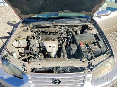 Zdjęcie 11 z 12 samochodu: 1999 TOYOTA CAMRY LE VIN:JT2BG22K5X0326667 - miniatura