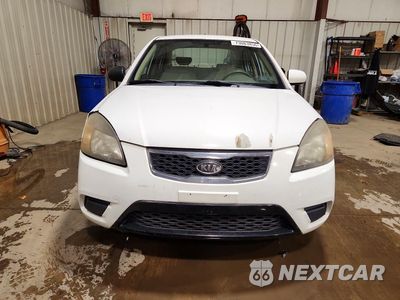 Piąte zdjęcie samochodu w środku: 2011 KIA RIO LX VIN:KNADH4A32B6955566 - miniatura