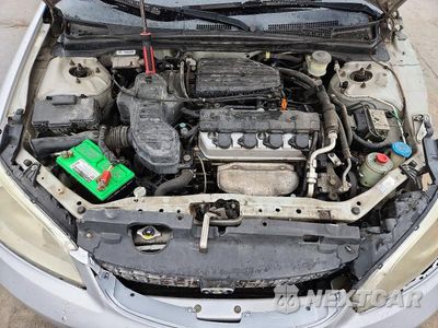 Zdjęcie 11 z 13 samochodu: 2004 HONDA CIVIC EX VIN:1HGEM22054L026604 - miniatura