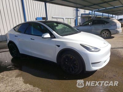 Czwarte zdjęcie samochodu z boku: 2023 TESLA MODEL Y VIN:7SAYGDEE5PF632470 - miniatura