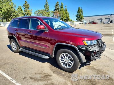 Czwarte zdjęcie samochodu z boku: 2019 JEEP GRAND CHEROKEE LAREDO VIN:1C4RJEAG5KC699110 - miniatura
