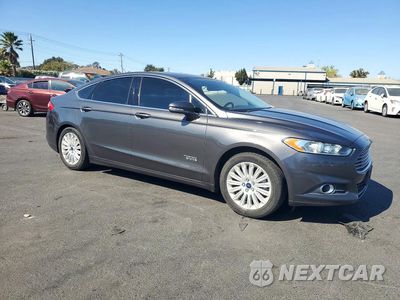 Czwarte zdjęcie samochodu z boku: 2016 FORD FUSION SE PHEV VIN:3FA6P0PU6GR357150 - miniatura