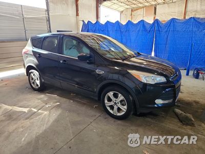Czwarte zdjęcie samochodu z boku: 2014 FORD ESCAPE SE VIN:1FMCU9GX9EUC03053 - miniatura