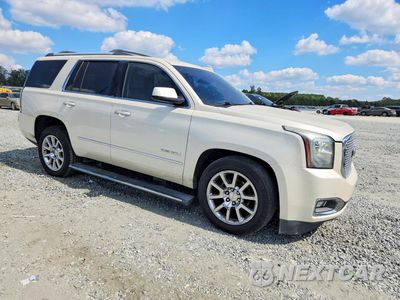 Czwarte zdjęcie samochodu z boku: 2015 GMC YUKON DENALI VIN:1GKS2CKJ0FR742367 - miniatura