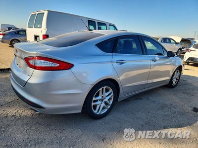 Trzecie zdjęcie samochodu z tyłu: 2016 FORD FUSION SE VIN:3FA6P0H73GR378563 - miniatura