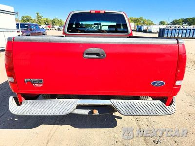 Zdjęcie 6 z 12 samochodu: 2002 FORD F-150 VIN:1FTRX17W32NB99490 - miniatura