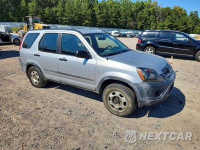 Czwarte zdjęcie samochodu z boku: 2005 HONDA CR-V LX VIN:SHSRD68575U302031 - miniatura