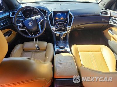 Zdjęcie 8 z 12 samochodu: 2015 CADILLAC SRX PERFORMANCE COLLECTION VIN:3GYFNCE39FS516126 - miniatura