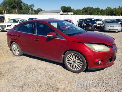 Czwarte zdjęcie samochodu z boku: 2014 FORD FOCUS TITANIUM VIN:1FADP3J29EL234289 - miniatura