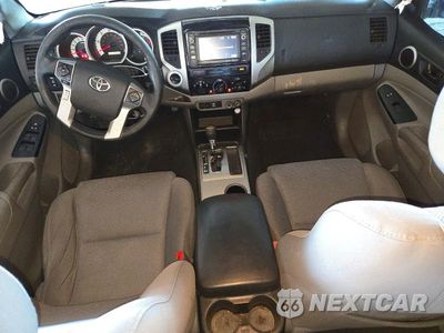 Zdjęcie 8 z 12 samochodu: 2015 TOYOTA TACOMA V6 VIN:3TMLU4EN2FM193366 - miniatura