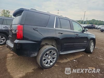 Trzecie zdjęcie samochodu z tyłu: 2018 CHEVROLET TAHOE K1500 PREMIER VIN:1GNSKCKC3JR202914 - miniatura