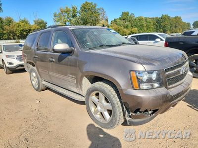 Czwarte zdjęcie samochodu z boku: 2011 CHEVROLET TAHOE K1500 LT VIN:1GNSKBE07BR373968 - miniatura