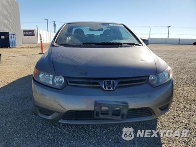 Piąte zdjęcie samochodu w środku: 2006 HONDA CIVIC LX VIN:2HGFG11666H554812 - miniatura