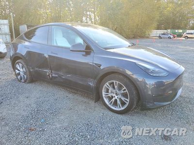 Czwarte zdjęcie samochodu z boku: 2023 TESLA MODEL Y VIN:7SAYGDEE6PF873745 - miniatura