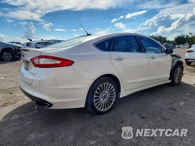 Trzecie zdjęcie samochodu z tyłu: 2015 FORD FUSION TITANIUM VIN:3FA6P0K96FR239486 - miniatura
