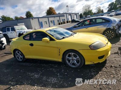 Czwarte zdjęcie samochodu z boku: 2006 HYUNDAI TIBURON GS VIN:KMHHM65D26U206004 - miniatura