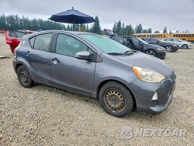 Czwarte zdjęcie samochodu z boku: 2012 TOYOTA PRIUS C ONE VIN:JTDKDTB30C1504598 - miniatura
