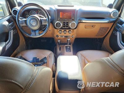 Zdjęcie 8 z 13 samochodu: 2014 JEEP WRANGLER UNLIMITED SAHARA VIN:1C4BJWEG1EL138487 - miniatura