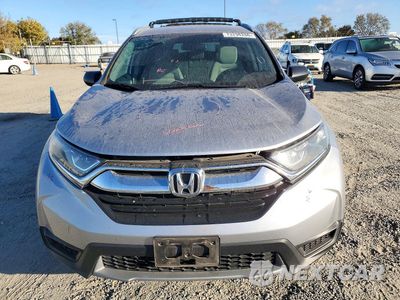 Piąte zdjęcie samochodu w środku: 2018 HONDA CR-V LX VIN:2HKRW6H34JH218020 - miniatura