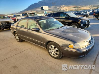 Czwarte zdjęcie samochodu z boku: 2001 MAZDA 626 ES VIN:1YVGF22C115242164 - miniatura