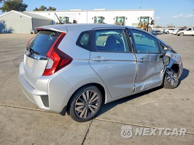 Trzecie zdjęcie samochodu z tyłu: 2015 HONDA FIT EX VIN:3HGGK5H88FM720931 - miniatura