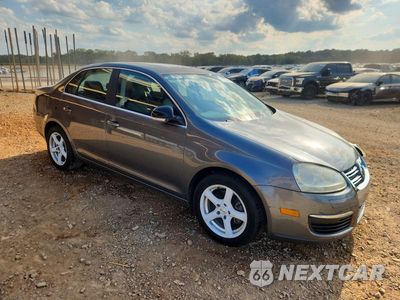 Czwarte zdjęcie samochodu z boku: 2009 VOLKSWAGEN JETTA SE VIN:3VWRM71K89M135299 - miniatura