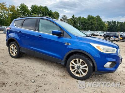 Czwarte zdjęcie samochodu z boku: 2017 FORD ESCAPE SE VIN:1FMCU9G90HUC98267 - miniatura
