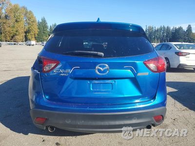 Zdjęcie 6 z 14 samochodu: 2014 MAZDA CX-5 TOURING VIN:JM3KE4CY7E0324211 - miniatura