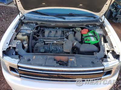 Zdjęcie 12 z 14 samochodu: 2016 FORD FLEX SEL VIN:2FMGK5C89GBA11638 - miniatura