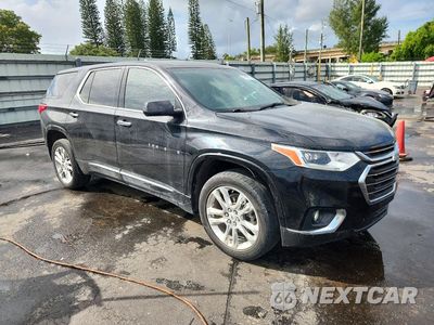 Czwarte zdjęcie samochodu z boku: 2021 CHEVROLET TRAVERSE LS VIN:1GNERFKW9MJ143486 - miniatura