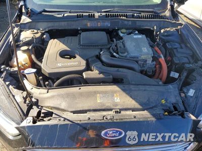 Zdjęcie 11 z 12 samochodu: 2014 FORD FUSION TITANIUM HEV VIN:3FA6P0RU3ER125132 - miniatura