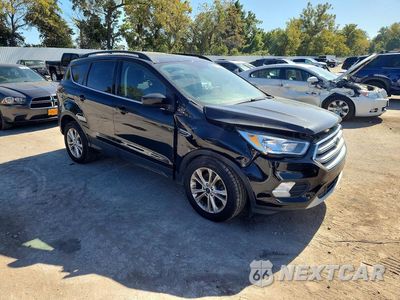 Czwarte zdjęcie samochodu z boku: 2018 FORD ESCAPE SE VIN:1FMCU9GD7JUD57356 - miniatura