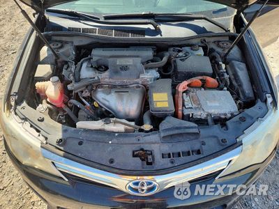Zdjęcie 11 z 12 samochodu: 2012 TOYOTA CAMRY HYBRID XLE VIN:4T1BD1FK5CU061221 - miniatura