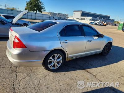 Trzecie zdjęcie samochodu z tyłu: 2012 FORD FUSION S VIN:3FAHP0GA2CR201325 - miniatura