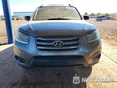Piąte zdjęcie samochodu w środku: 2012 HYUNDAI SANTA FE GLS VIN:5XYZGDAB6CG122449 - miniatura